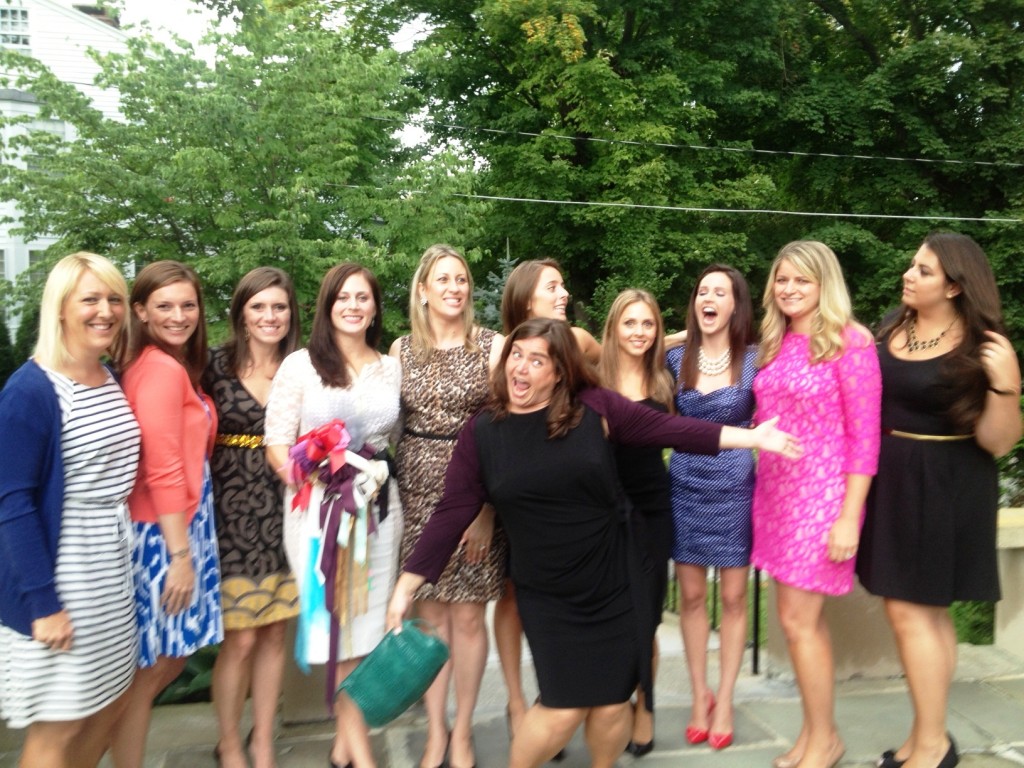 All of the bridesmaids. I'm the third one from the left in the black and yellow dress next to the bride-to-be.